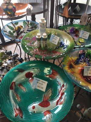 Large glass bird baths. They have smaller hanging ones. Some in copper.