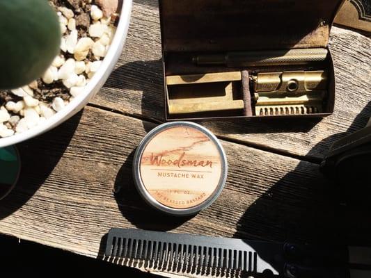 Woodsman Mustache Wax with The Bearded Bastard's signature wood label.