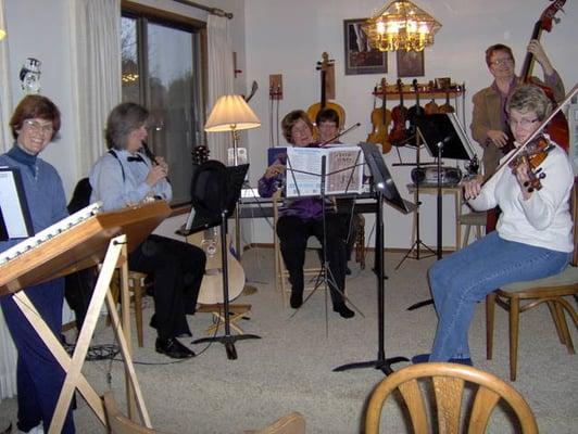 Some of Sue's adult students performing for a recital 2012