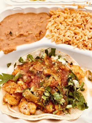 Fish Taco Plate deliciousness : -).  Refried Beans to die for with Spanish rice.