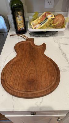 Les Paul shaped cutting board! Only about 30-ish bucks!