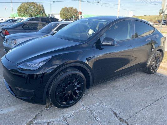 2020 Tesla Model Y with paint protection film, ceramic coating, and front windows tinted