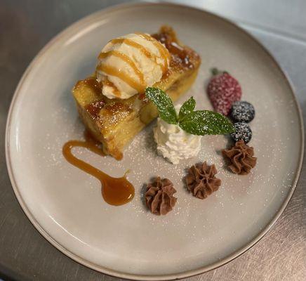 Bread Pudding Served with Vanilla Ice Cream and Caramel Drizzle