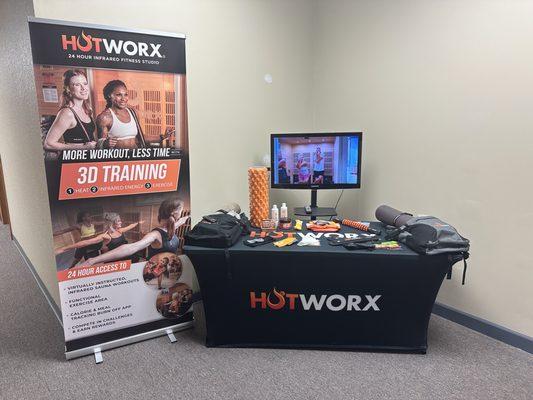 Hotworx presale center with sample retail items and workout gear