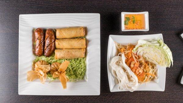 SLK Sampler.Thai or lao style papaya salad，lao sausages,egg rolls and money bags.