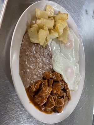 Carne Guisada and Eggs