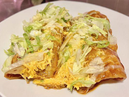 Chicken Enchiladas. The chicken is so juicy and tender. It's definitely something to try.