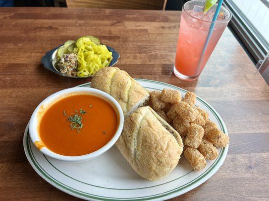 Loose Goose sandwich with tomato soup and tater tot's, with the cherry limeade soda