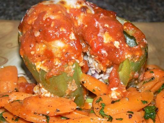 Baked Stuffed Green Peppers with Ground Turkey, Brown Rice, Black Olives, Red Onion, Red Pepper, Corn, Eggs, Thai Chili Paste.