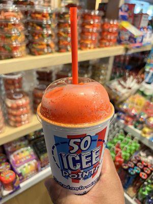 Strawberry Icee with lihing mui powder and juice.