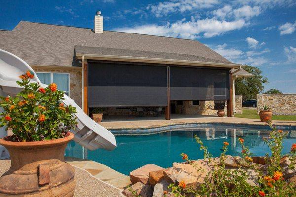 Enhance your outdoor space with our stylish, durable shades! Stay cool and comfy in Houston's weather. Contact Bumble Bee Blinds today!