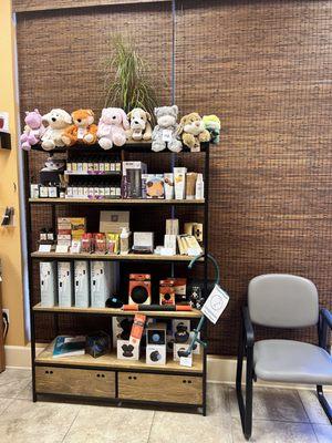 Our display shelf filled with healing products and self care items