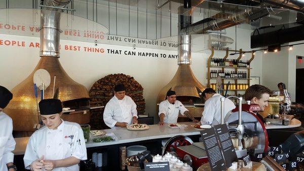 Pizzaioli with wood-fire ovens