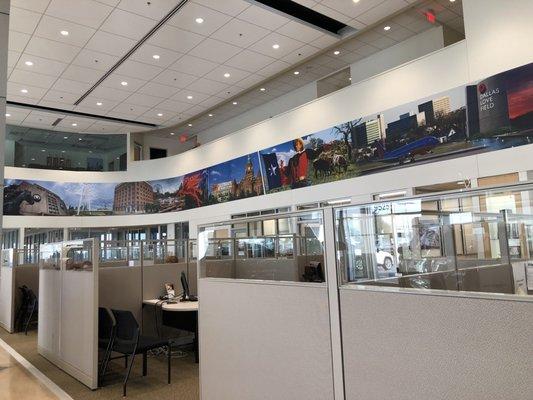 Car sales area. Notice the nice artwork on the second floor.