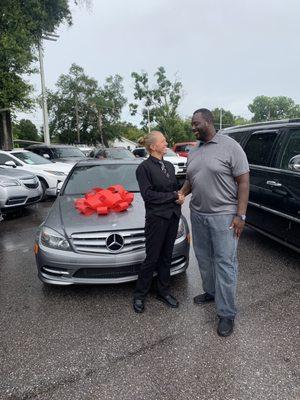 Kelli is about to drive off with her Mercedes!