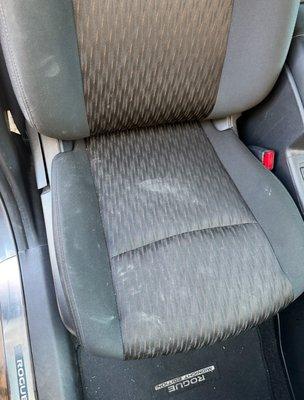 Filthy passenger seat left by mechanic