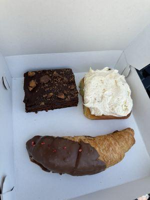 Chocolate peanut butter cup brownie, frosted cinnamon roll, raspberry and Nutella filled croissant dipped in chocolate