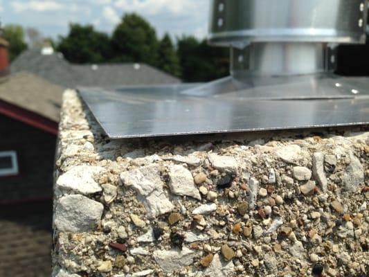 Patrick's faulty work - top of chimney not sealed, causing water damage.