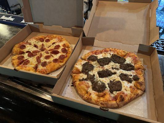 Pepperoni pizza and meatball pizza