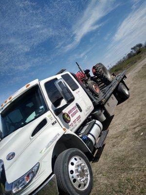 Farm tractor towing