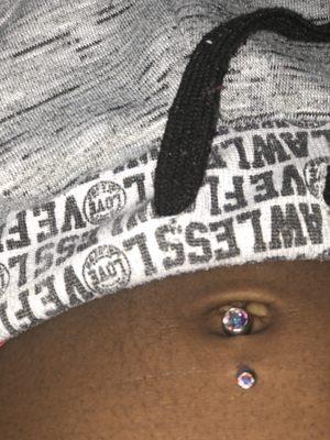 A belly button piercing