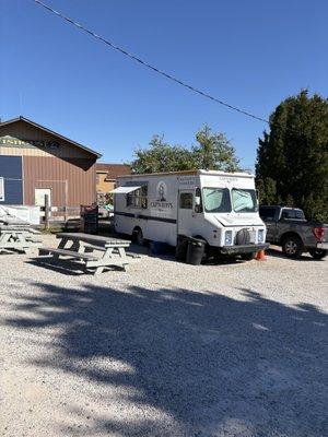 Food truck and picnic table seating