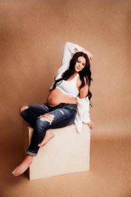 In studio maternity session with hair and makeup add on.