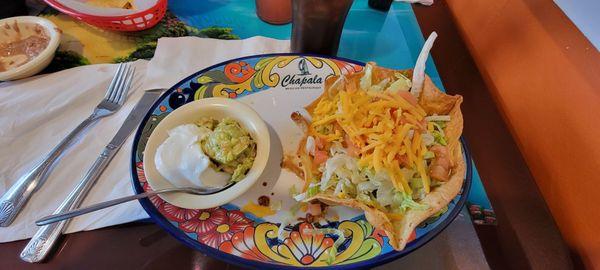 Taco Salad with side of guacamole & sour cream.