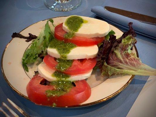 Sweet and perfectly ripe tomatoes with fresh mozzarella.  Delicious!