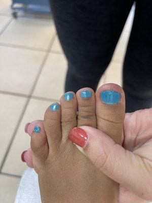 Nails not painted correctly, just thrown on, looks like she painted them her self