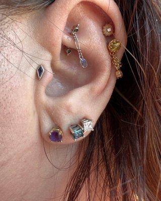 New tragus and charm for my rook. Stevo the bottom helix is also jewelry from Bloom.