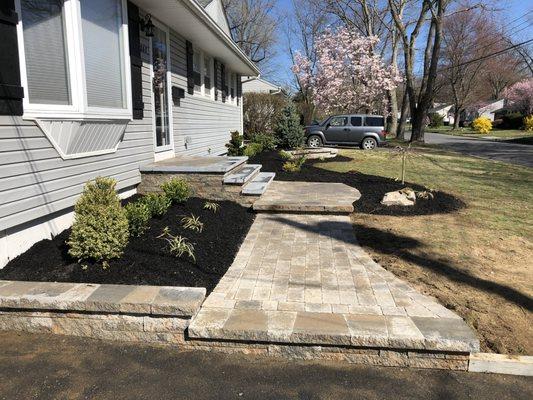 New paver walkway, stairs, and landscaping