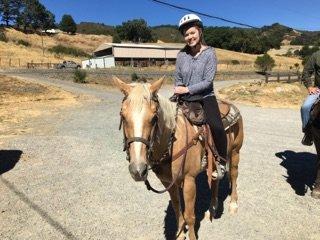 My daughtwr on her first horseback ride.  She loved it.