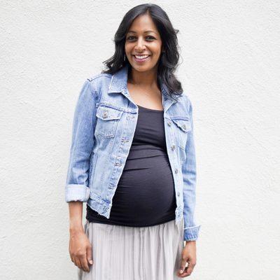 mom on baby #3 wearing  all reg curated for preg: denim jacket, original cinch top,milan maxi skirt/dress