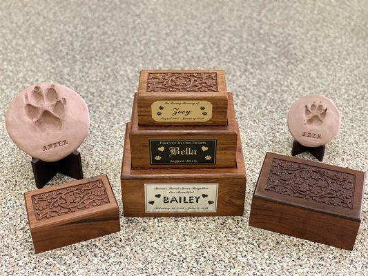 We offer engraved name plates for this urn. Pictured with a lovely clay paw print keepsake.