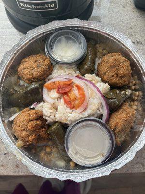 Lebanese Rice Bowl with Grape Leaves and Falafel