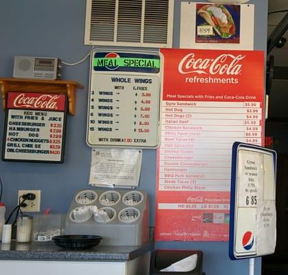 More menus (food and prices are scattered all over the walls and windows)