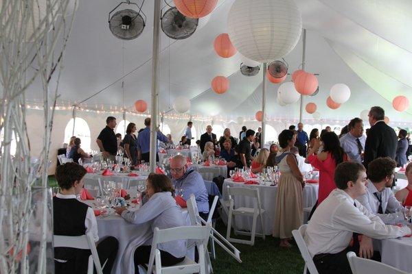 An outdoor wedding reception at the venue at River Bend Golf Club.