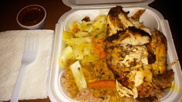 Jerk chicken white, cabbage, rice & peas w/curry sauce!  Delicious!  Absolutely the best Jamaican food in metro Atlanta!