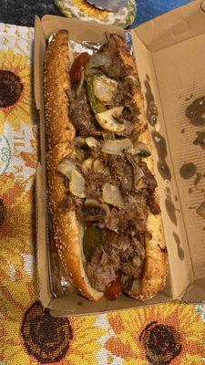 Cheesesteak with onions, mushrooms and hot peppers