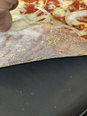 So thin that toppings bled through