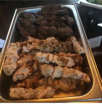 Private Christmas, catering beef, and veggie skewers