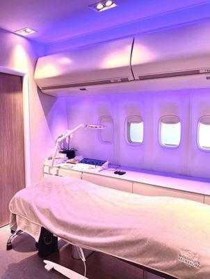 How beautiful is this space?! Set up to look like an airplane where you can relax and make your destination to glowing skin!