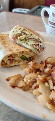 Bacon tomato avocado breakfast burrito