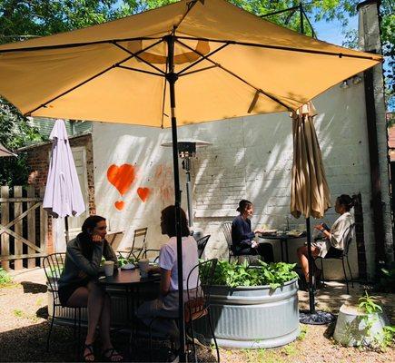 Cozy back patio...pure Ann Arbor in spades.