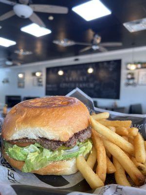 Avocado burger with fries