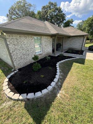 Flowerbed that we designed and installed from scratch