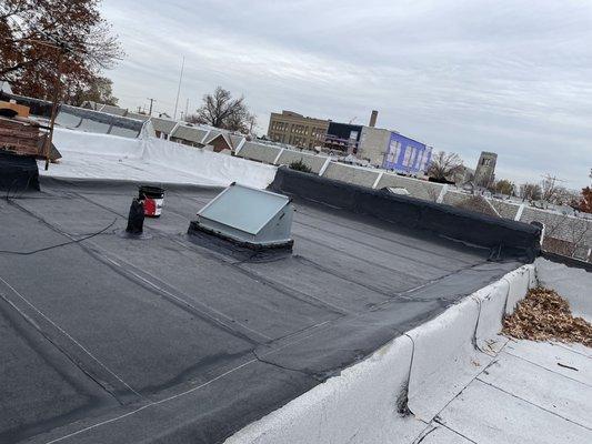 New rubber roof with new skylight. Beautiful work