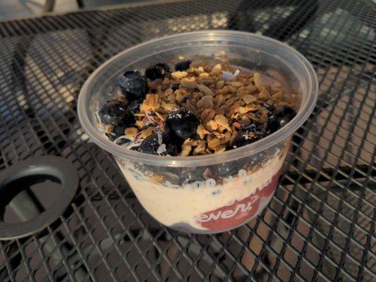 Half Acai - Half Coconut base with blueberries, shredded coconut, cacao nibs, and granola