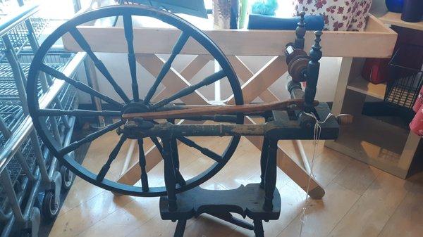 Antique spinning wheel $79.99. Time to make my own clothes? Hope I don't prick my finger. LOL